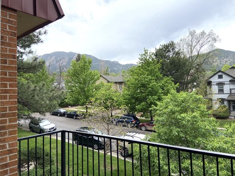 the view from the balcony of a college townhome unit